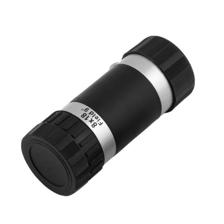 Black monocular telescope on a white background