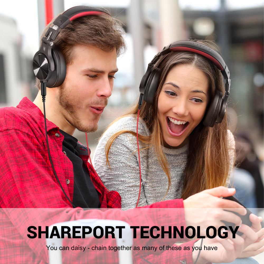 Two people wearing headphones looking at a device with 'Shareport Technology' branding.