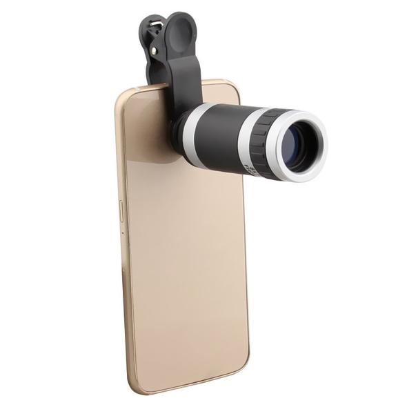 Phone with a camera lens attachment on a white background