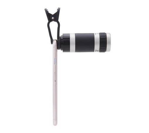 Phone with a detachable camera lens and clip on a white background